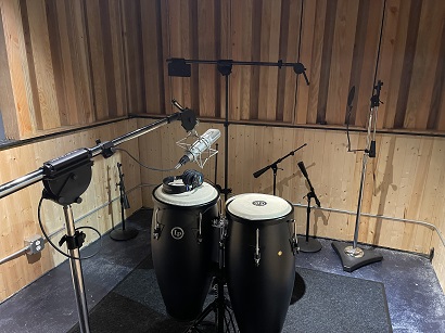 Recording congas.